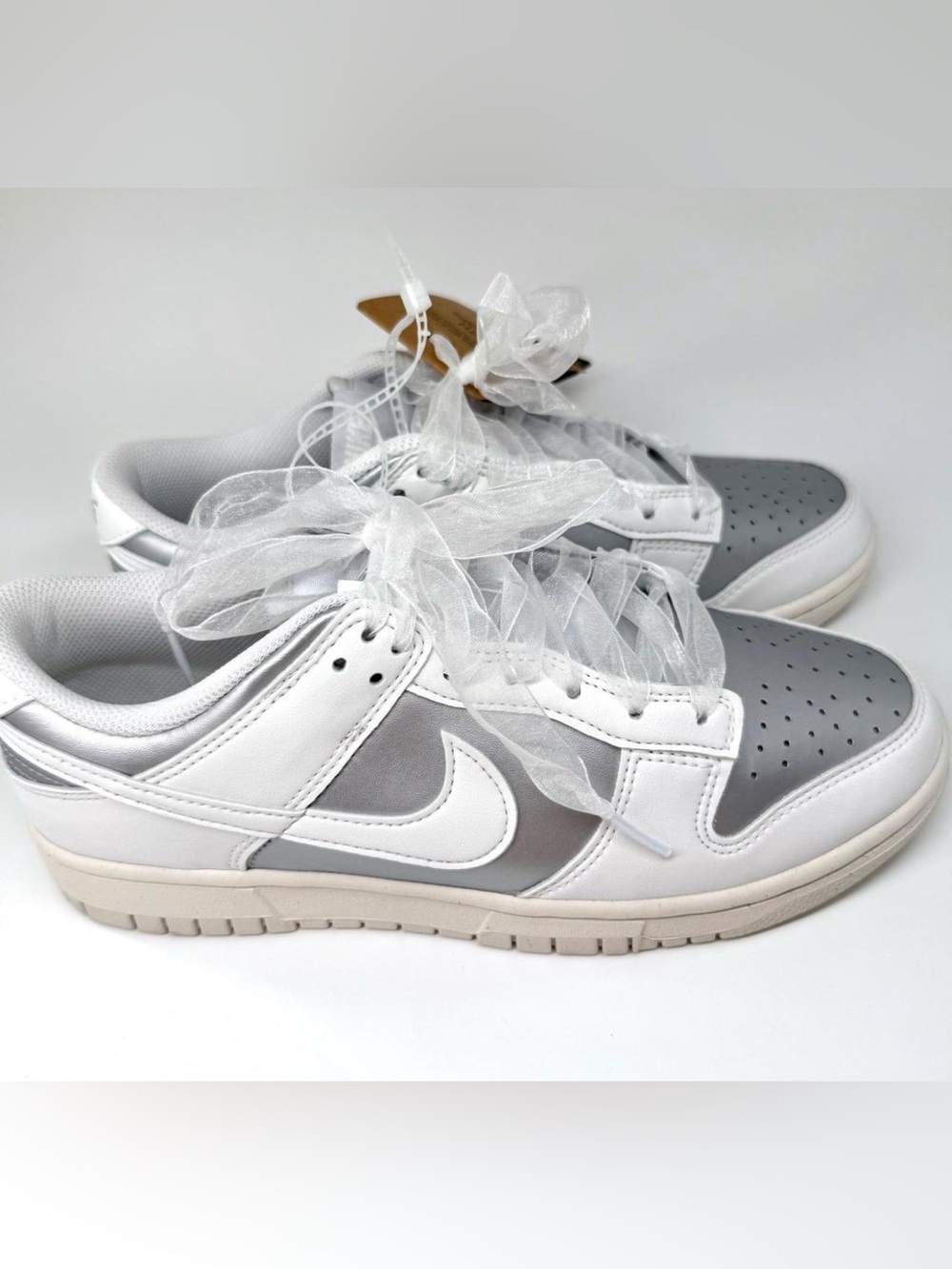 Nike Women’s Dunk Low-Top Sneakers in White and Gray